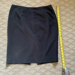 Tahari black pencil skirt, size 10, red lining